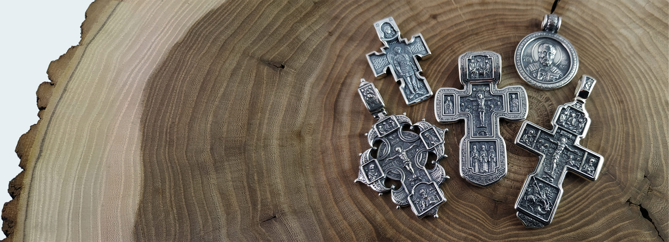 Large selection of silver<br/>crosses and amulets